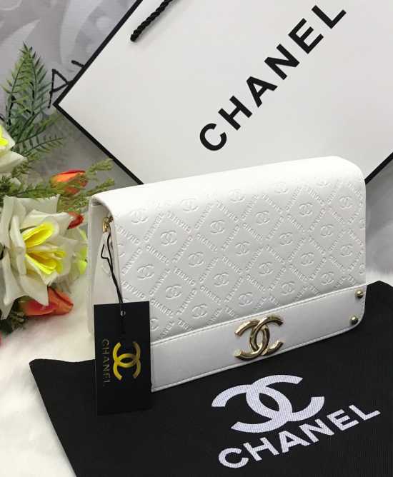 CHANEL  Size : 6"  by  9" Stylish & Unique Side Cross Body Bag